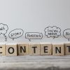 Create Content strategy Concept. Content wording on wooden cubes with speech bubbles. professional copywriter